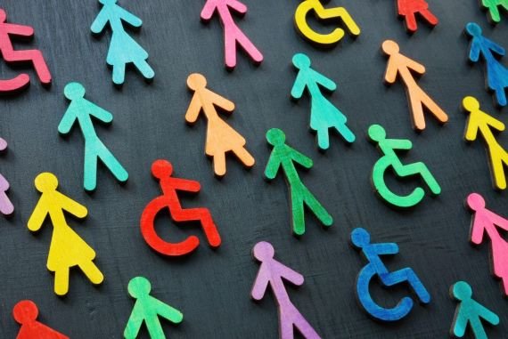 Colourful wooden figures of people